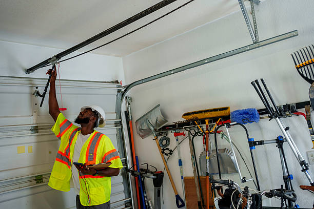Professional Garage Door Panel Replacement technician working in Ellsworth County County, KS